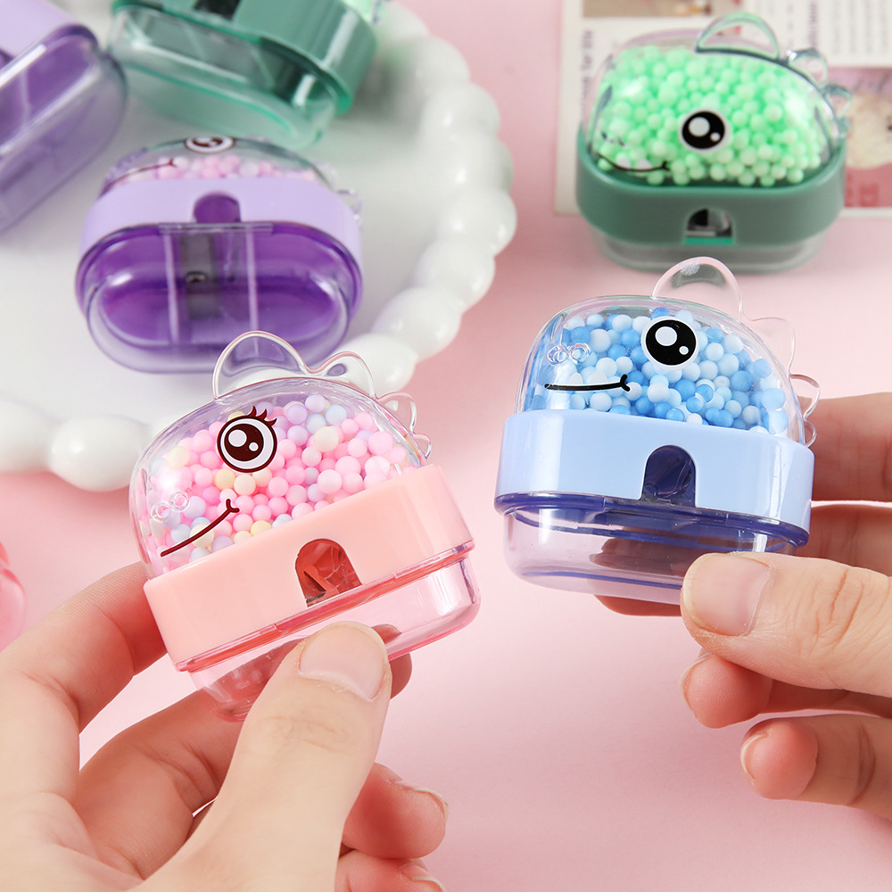 Bonito dinosaurio espuma bola lápiz cuchillo de lápiz de bola de burbujas colorida Tiranosaurus afilador de lápiz estudiante cuchillo de lápiz papelería