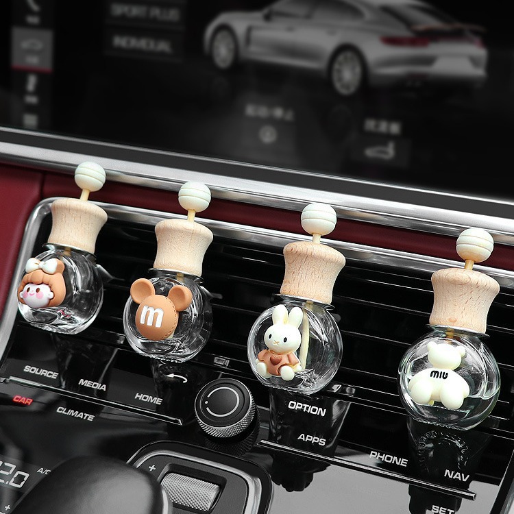 Aromaterapia de coche nuevo 2024 aire acondicionado de coche salida de aire botella de decoración perfume fragancia ligera de larga duración pequeña decoración de coche