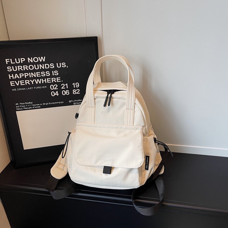 Mochila diaria nueva moda casual versátil marea de hombro femenino viaje ligero estudiantes de clase 2026