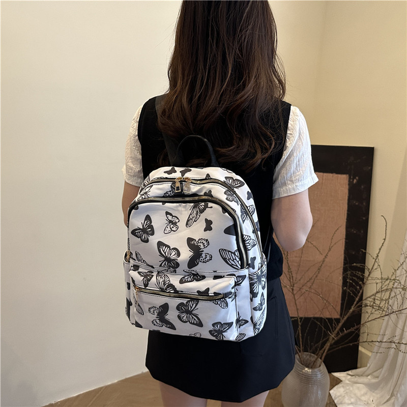 2025 nueva moda versátil mochila impresión dulce estilo universitario alto valor de la cara mochila de estudiantes bolso de hombro