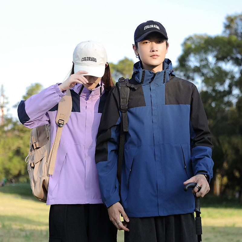 Primavera y otoño deportes al aire libre pareja de moda casual sombrero desmontable color a juego hombres y mujeres chaqueta delgada entrega en vivo