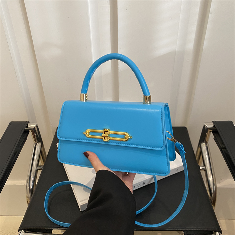 Nicho francés bolso bajo la axila para mujeres 2025 nuevo bolso cuadrado de textura personalidad bloqueo de moda mochila de hombro