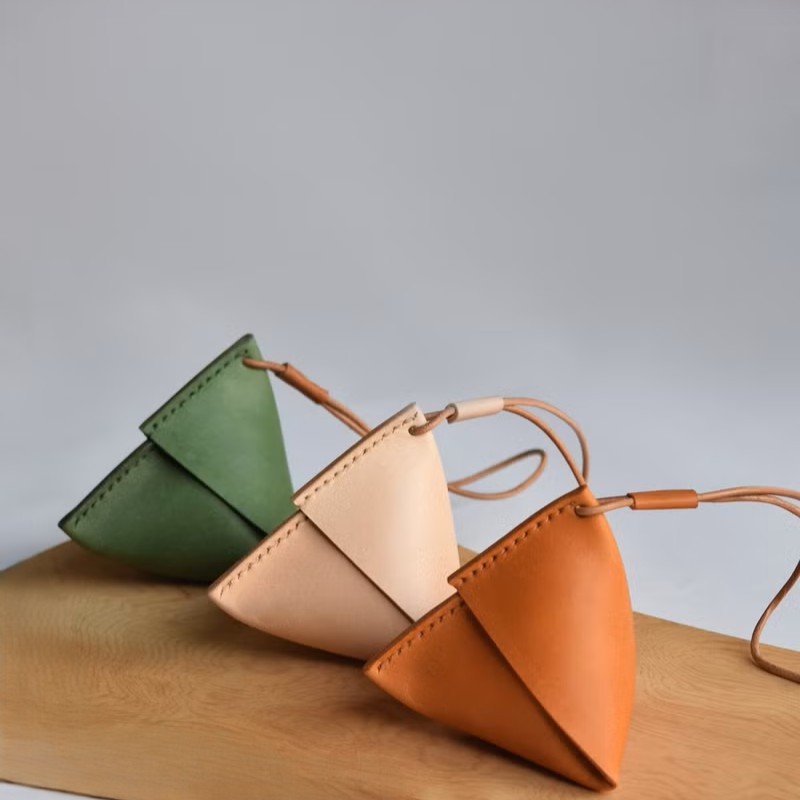 창의적이고 간단한 가죽 콘도르 동전 지갑 데이터 케이블 헤드폰 케이블 보관 가방 휴일 작은 선물 삼각형 지갑