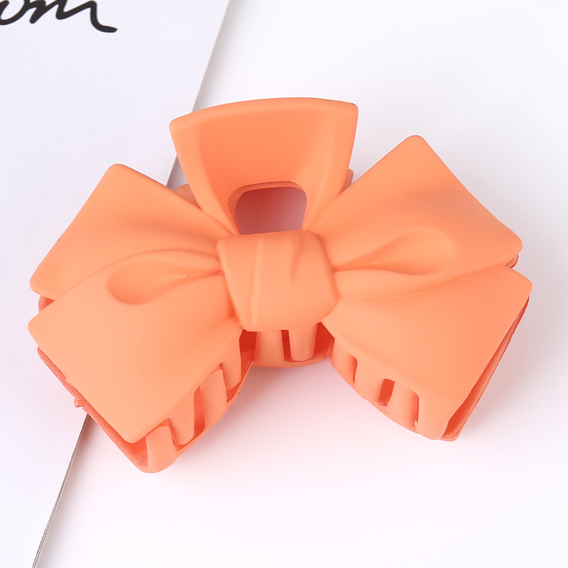 Sweet Solid Color Bow Knot Plastic Hair Claws display picture 3