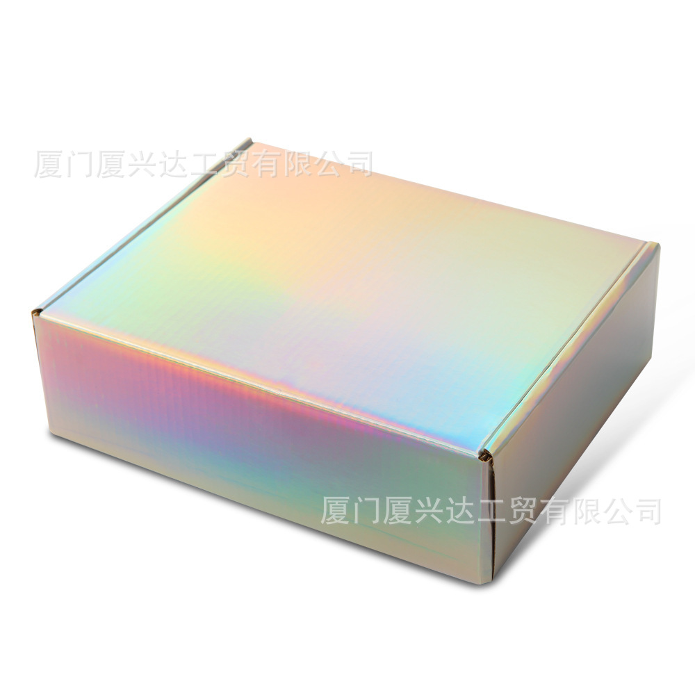 Caja de avión de papel ondulado de oro y plata láser caja de embalaje expreso duro caja de regalo de stock caja de regalo de fiesta