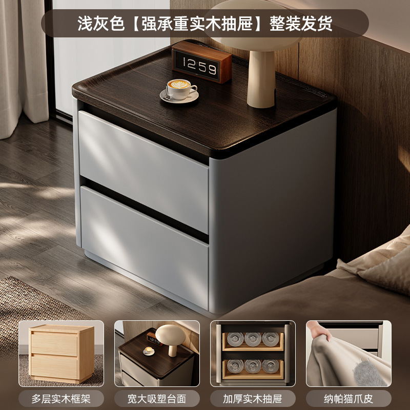 Minima mesita de cama de madera maciza2025 nuevo diseño de alta sensación de lujo ligero moderno y simple gabinete de cama de dormitorio familiar