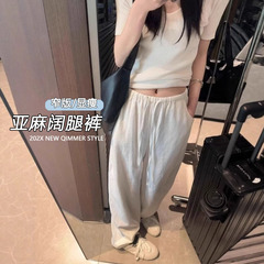 亜麻のワイドパンツの女性の夏の薄いタイプの高腰の垂れ下がった感がゆったりしていて、やせています。
