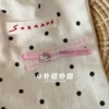 Pink plaid cross clip