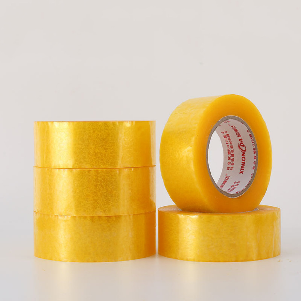 Cinta transparente de alta viscosidad para sellar cajas, cinta de embalaje, cinta de sellado para envíos exprés de comercio electrónico, cinta amarilla, venta al por mayor por caja, personalizable.