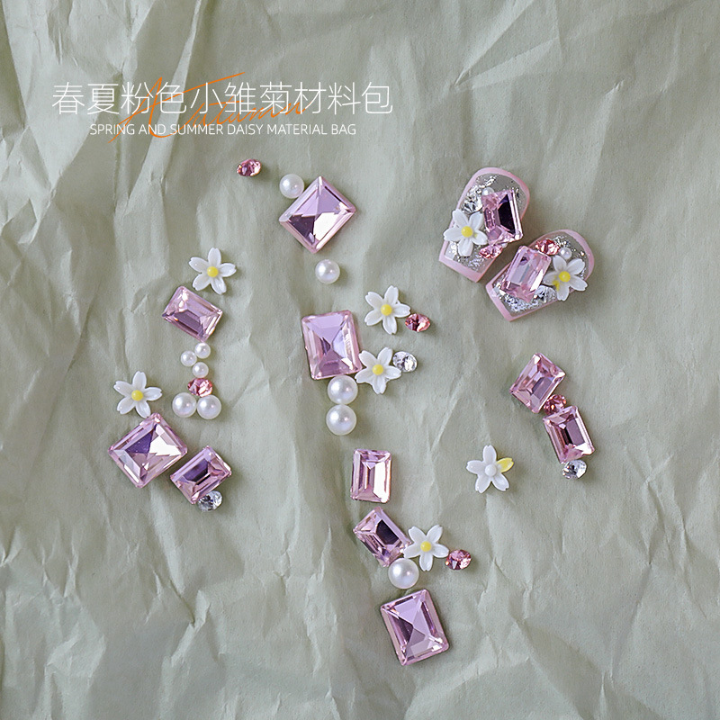 Manicura nueva primavera y verano hierba verde diamante verde margarita pequeña pila diamante perla verde puntiagudo diamante perla combinación de material de perla al por mayor