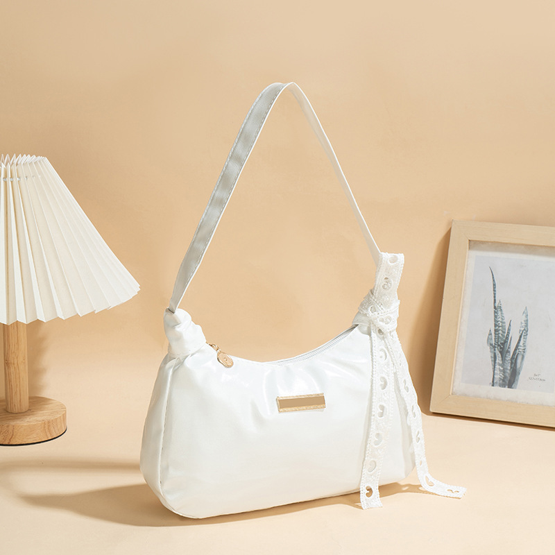 Bolso de cuero PU suave de cuero de aceite 2025 nueva moda universal bolso de moda de mujer bolso de brazo portátil pequeño