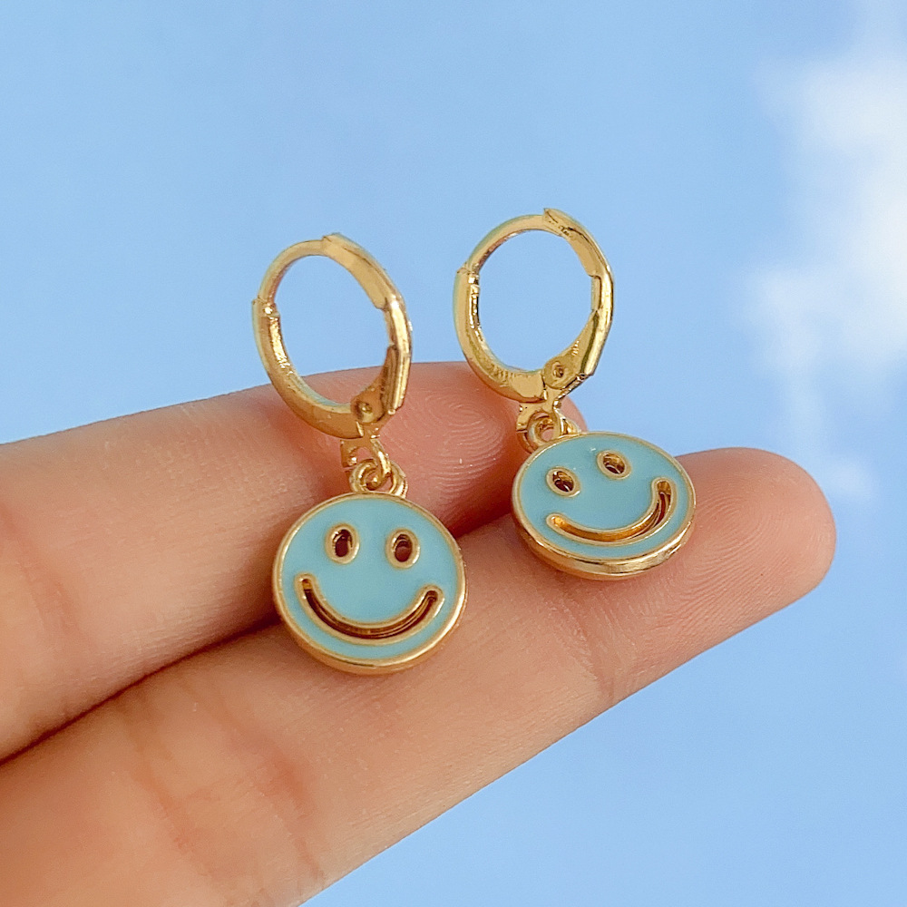 Europe and America Cross Border New Personalized Creative Smiley Face Earrings Fashion Hollowedout DoubleSided Multicolor Smiley Face Ear Clip Accessories Jewelrypicture1