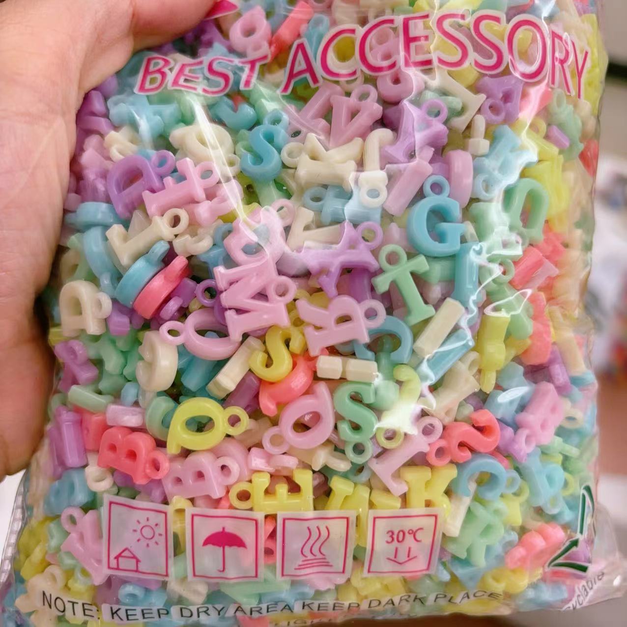 2025 Nuevas cuentas de cabello baratas en bolsa nuevas cuentas de plástico de color primavera diy gran agujero image 12