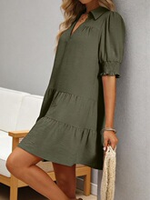 A women's solid color pleated V-neck spliced sleeve dress,