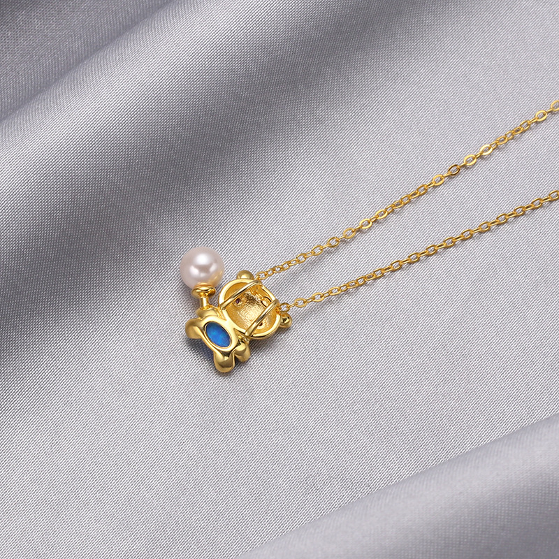 Creativo lindo colgante de plata Corea del Sur s925 plata esterlina perla oso clavícula cadena nicho Collar para las mujeres al por mayor