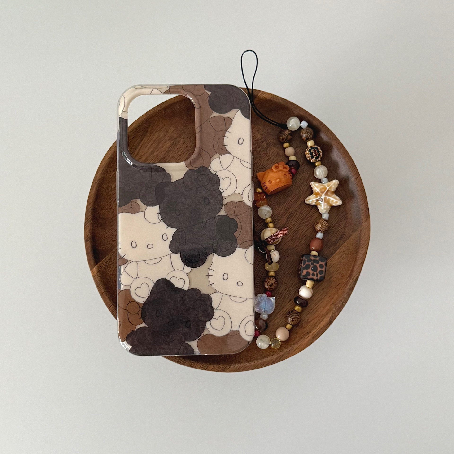 Divertida galleta de dibujos animados KT gato para Apple 16ProMax funda para teléfono móvil 15Pro nicho 14/13 cadena 15PM