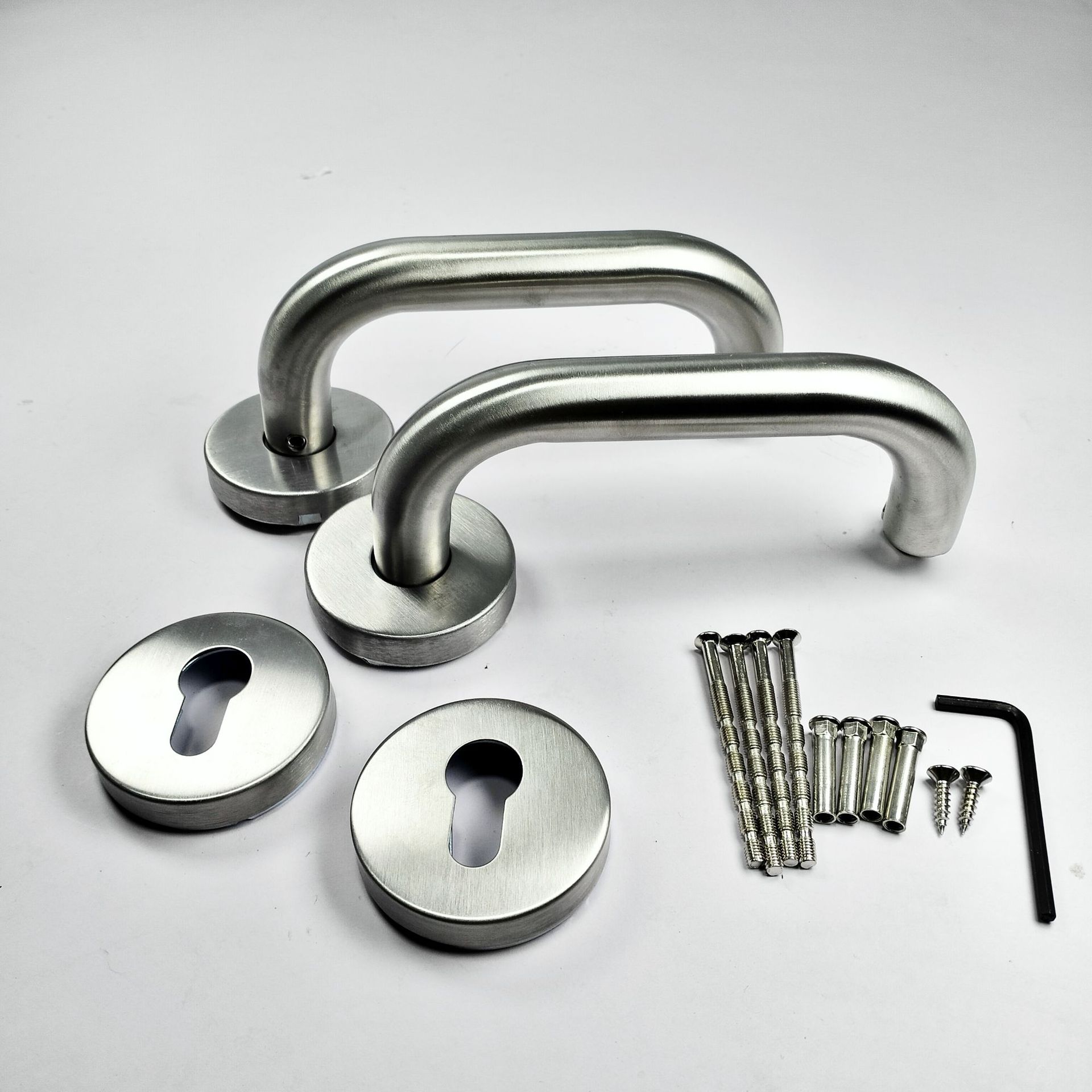 Cerradura dividida de una sola lengua de acero inoxidable, puerta cortafuego de doble curva, cerradura de manija, dormitorio, baño, manija de puerta de madera, fábrica al por mayor
