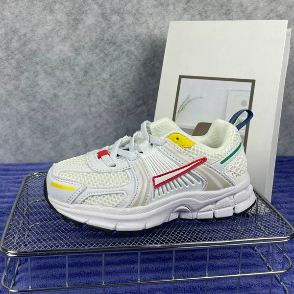 Top a Simple and Versatile Children's Retro Casual Sneaker with Breathable Mesh and Cushioning Technology