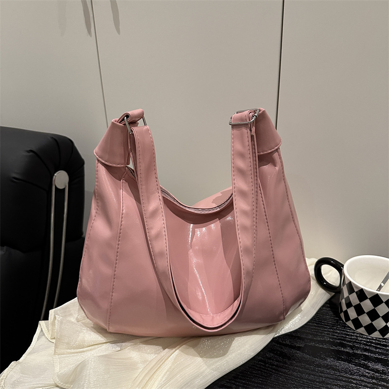 relajado cera de piel bolso de mujer 2025 nuevo estilo primavera y verano de moda de viaje bolsa de mano ocio versátil mochila