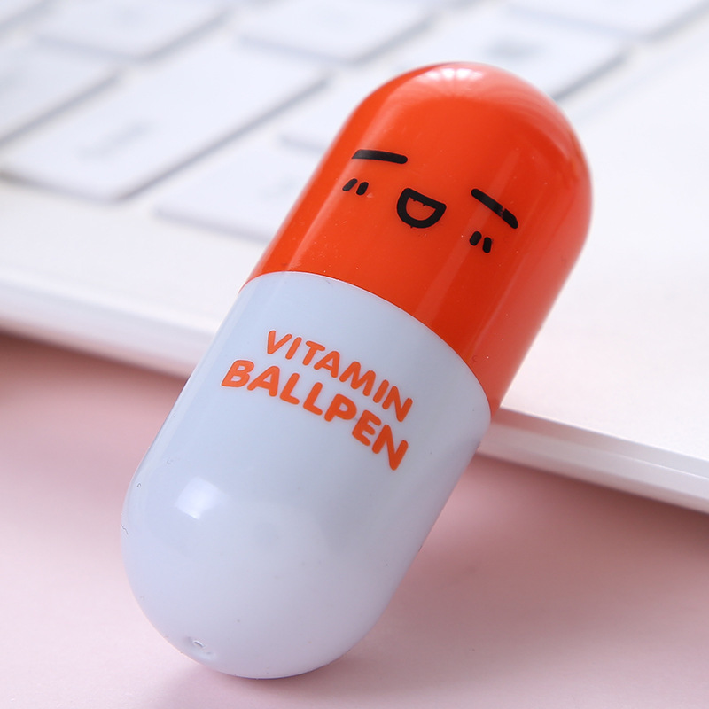 Nuevo mini cara sonriente emoji píldora bolígrafo plástico retráctil creativo rompecabezas estudiante papelería regalo al por mayor