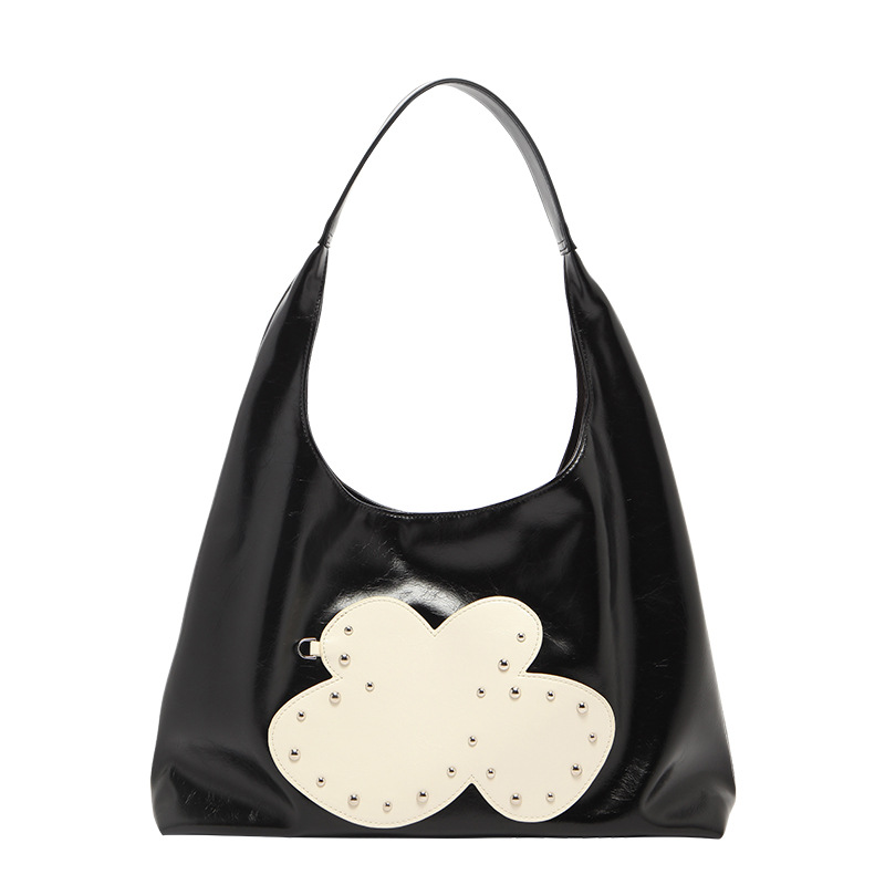 Hobo Niş Tasarım 2025 İlkbahar ve Yaz Yeni Kadın Perçinli Elde Taşınabilir Büyük Kapasiteli Çanta Moda Çok Yönlü Günlük Kişiselleştirilmiş Niş_voghion.com