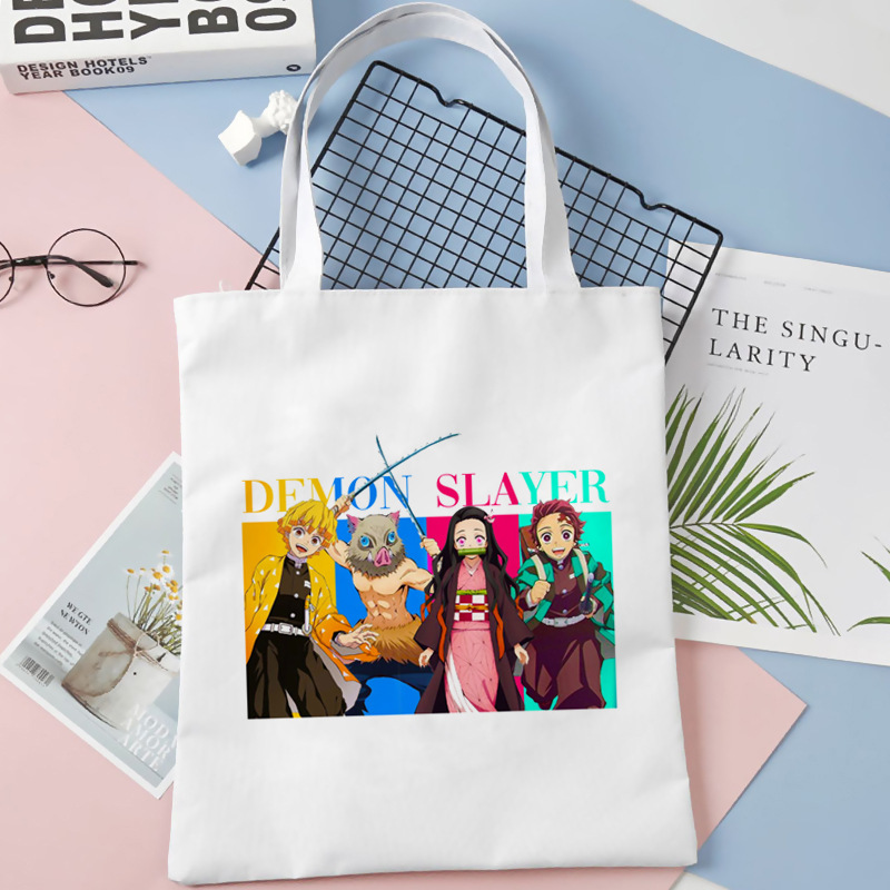Comercio exterior transfronterizo Demon Slayer impresa bolsa de lona Harjuku bolsa de hombro bolsa de compras portátil de moda para estudiantes