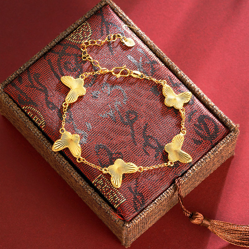 Nuevos productos en simple mariposa estriado universal lujo ligero pulsera alta sensación chapado de alta preservación de color fábrica al por mayor suministro