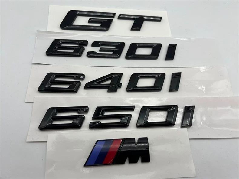 Suitable for BMW's new GT 630i, 640i, and 650i models; includes glossy black emblems, lettering, and rear emblems