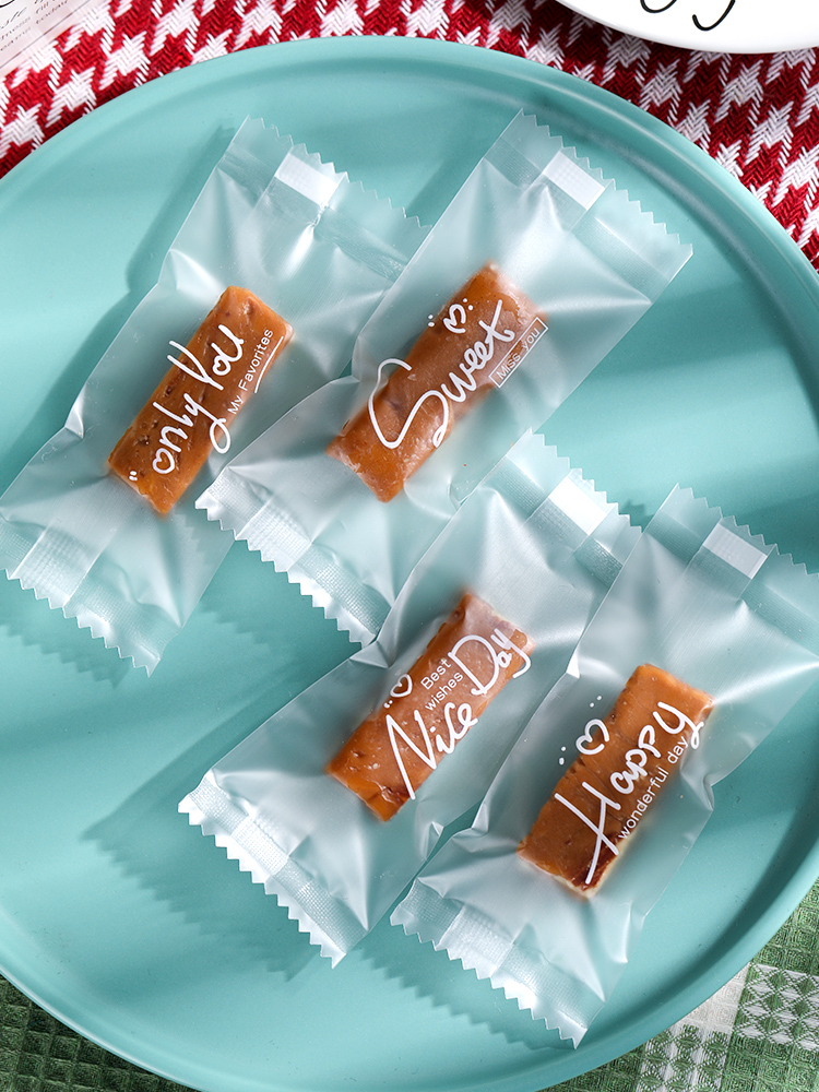 Bolsa de embalaje de nougat, embalaje de toffee, papel de azúcar, bolsas de pastel de leche de mango, sello de máquina transparente, bolsas pequeñas letras esmerizadas
