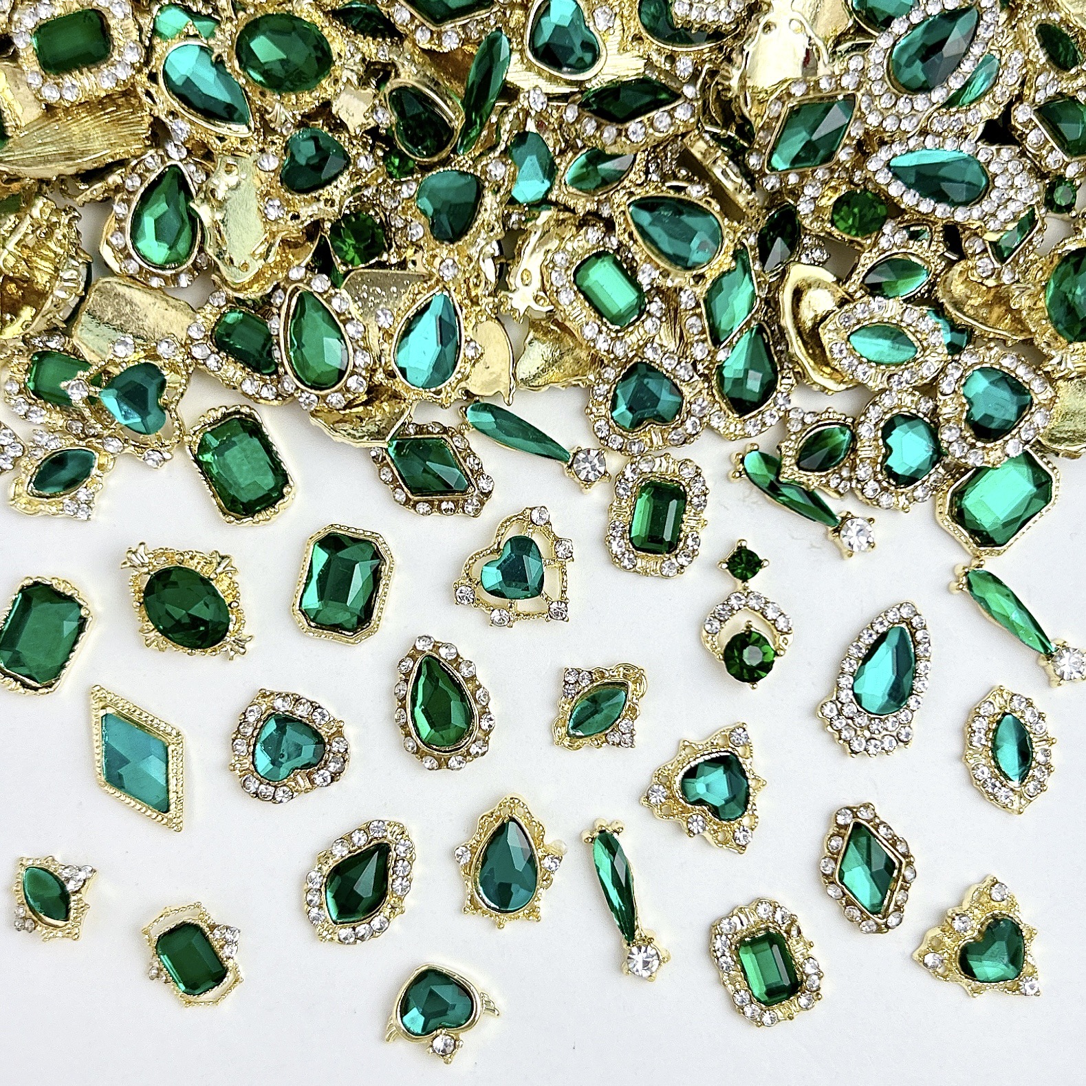Nueva aleación china joyas de manicura taladro explosión grasa flash Fang amor gota de agua XiFeiYuan la misma armadura de la corte con taladro