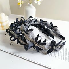 メッシュの2色の高級感のある蝶結びのカチューシャ