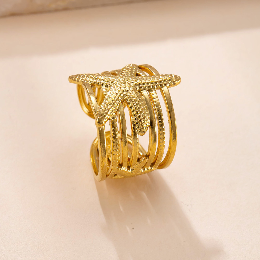 Anillo de acero inoxidable europeo y americano Moda femenina Anillo de estrella de mar hidráulico geométrico Chapado en oro de 18 quilates Anillo de amor Joyas de acero de titanio