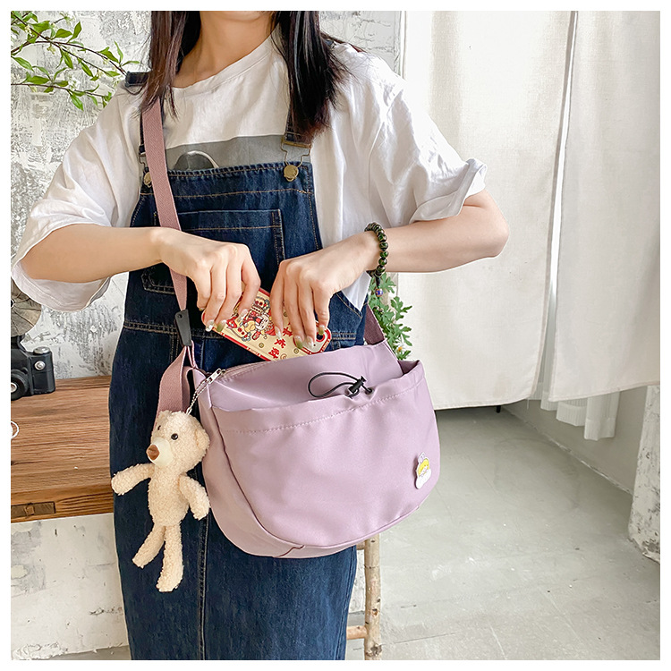 The new 2022 Little Bear canvas small bag for women is simple and versatile. The student dumpling bag is a trendy casual single-shoulder crossbody bag undefined