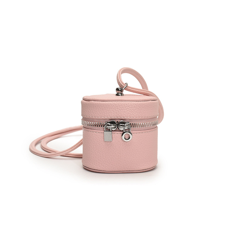 Bolso de hombro para niña coreana simple color sólido mini lindo bolso de cubo para bebé 2025 nuevo bolso de auriculares para niños marea