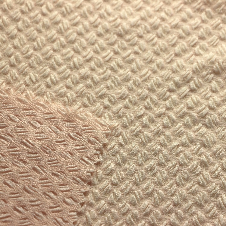 提花咖啡豆单面布汗布服装面料针织纬编全涤氨纶起皱泡泡单面布料