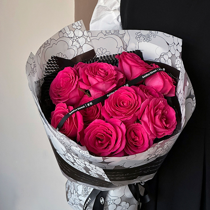 Fábrica al por mayor tienda de flores personalizada material de embalaje floral película de extinción impermeable historia de jardín embalaje de flores papel ligero