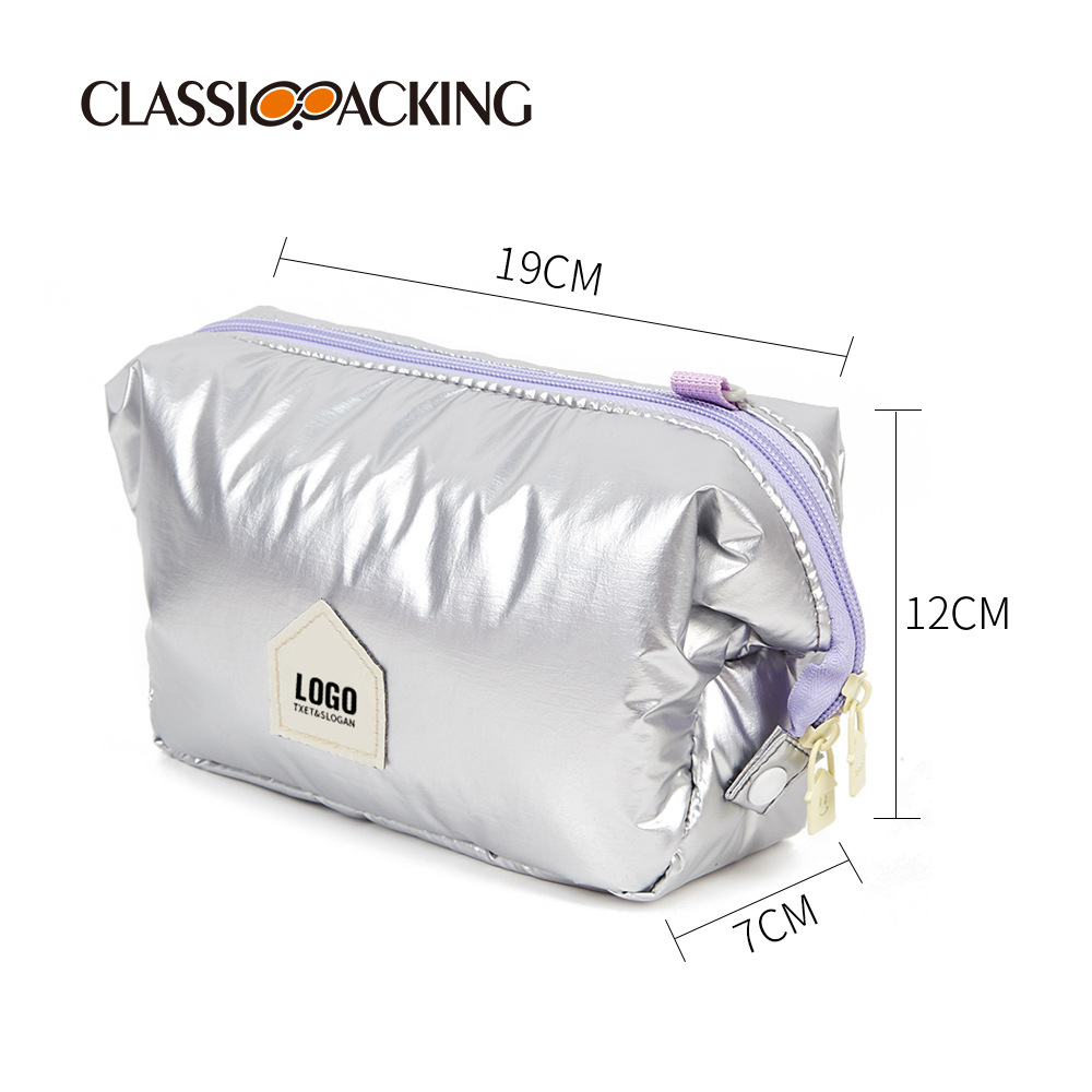 Los fabricantes venden al por mayor bolsas espaciales de otoño e invierno, bolsas de cosméticos de nicho portátiles, bolsas de lavado de moda impermeables para viajes para mujeres, se pueden agregar logotipos