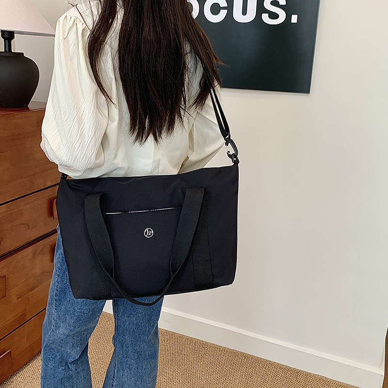 Primavera nueva bolsa de viaje impermeable de gran capacidad de alto valor, bolsa diagonal de un solo hombro para mamá de compras portátil de moda