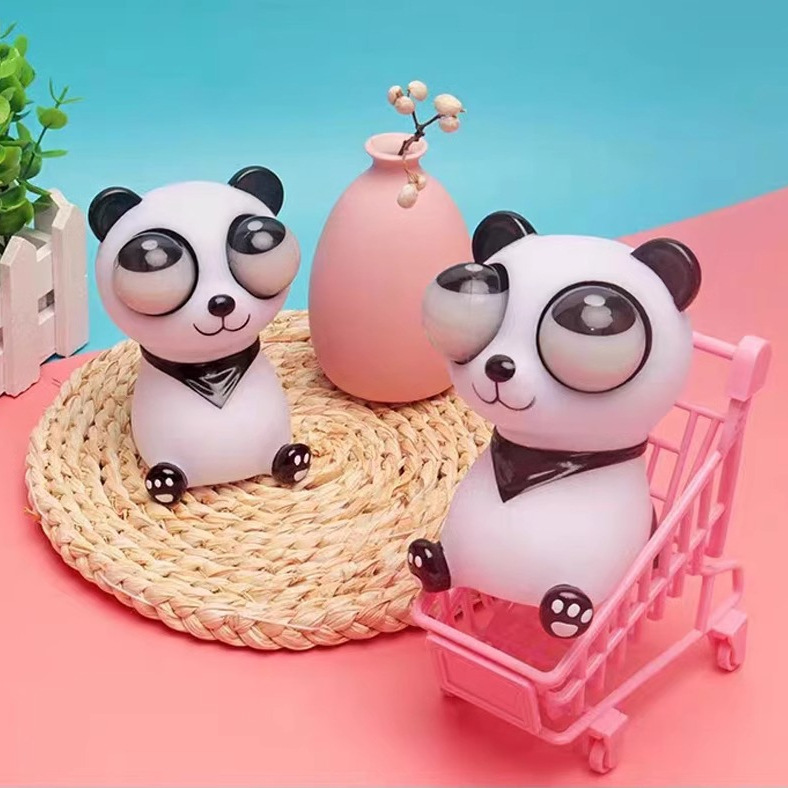 Juguetes panda de ojos explosivos exprimieron los ojos, descomprimieron la presión, amasaron la música, descomprimieron los artefactos, los niños desahogaron pequeños regalos divertidos para la cirugía plástica.