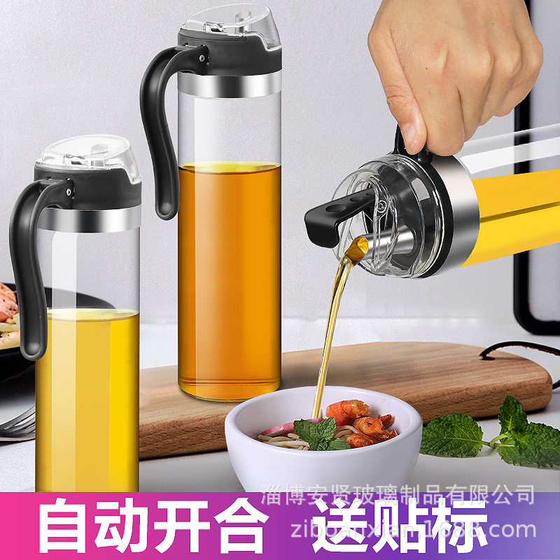 Apertura y cierre automático del engrasador de vidrio boquilla de aceite de acero inoxidable botella de aceite de inducción por gravedad botella de condimento de frasco de aceite doméstico de vidrio