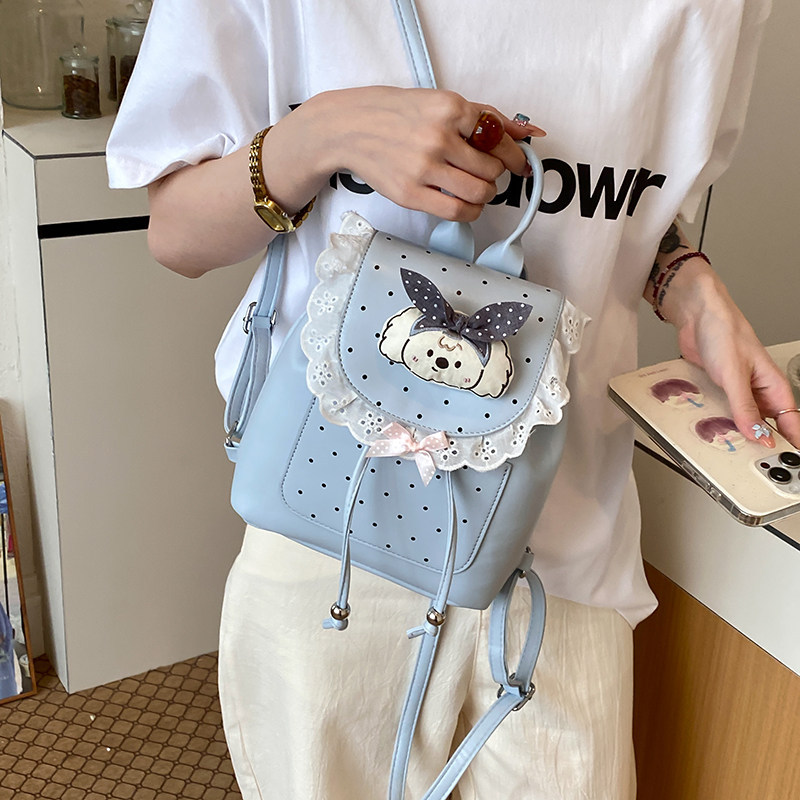 Mochila casual mochila de verano dibujos animados 2026 encaje versátil mochila escolar de mujer de viaje nuevo lindo punto de onda popular