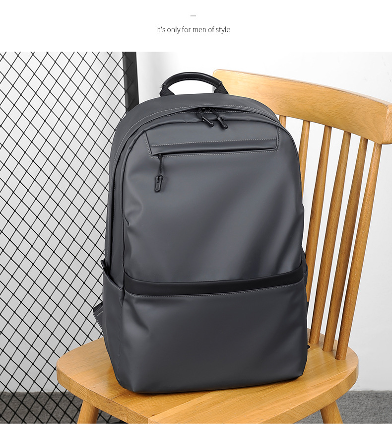 A new minimalist backpack for men, a Korean-style casual and fashionable backpack for laptops, with a logo printed on it undefined