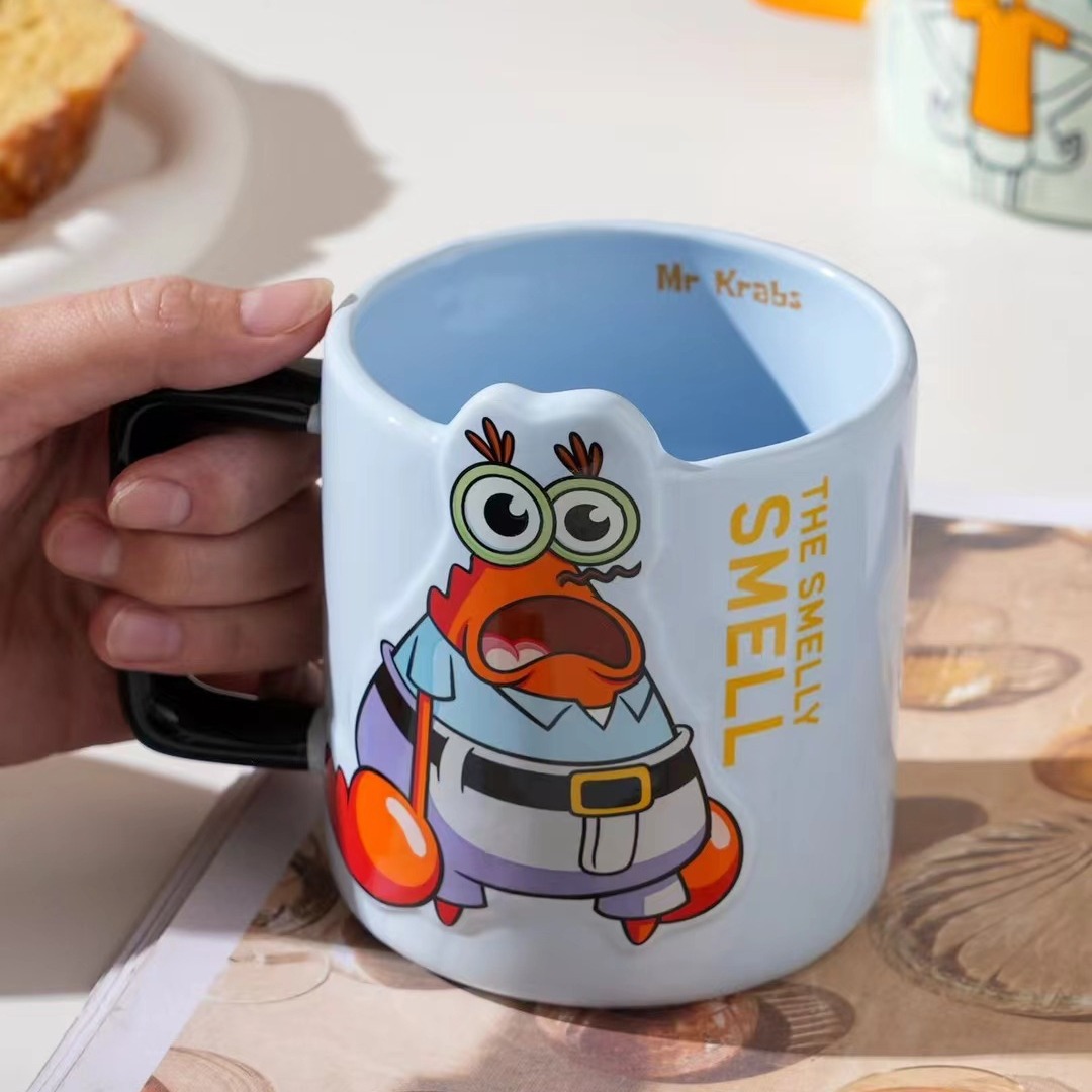 Productos genuinos creativos esponja bebé de dibujos animados Taza de cerámica personalizada taza de desayuno lindo taza de beber con la mano taza de regalo