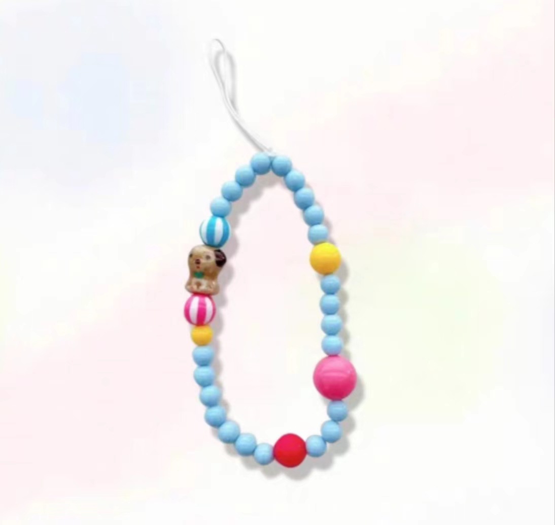 Cadena de cuentas de polvo amarillo azul cachorro marrón