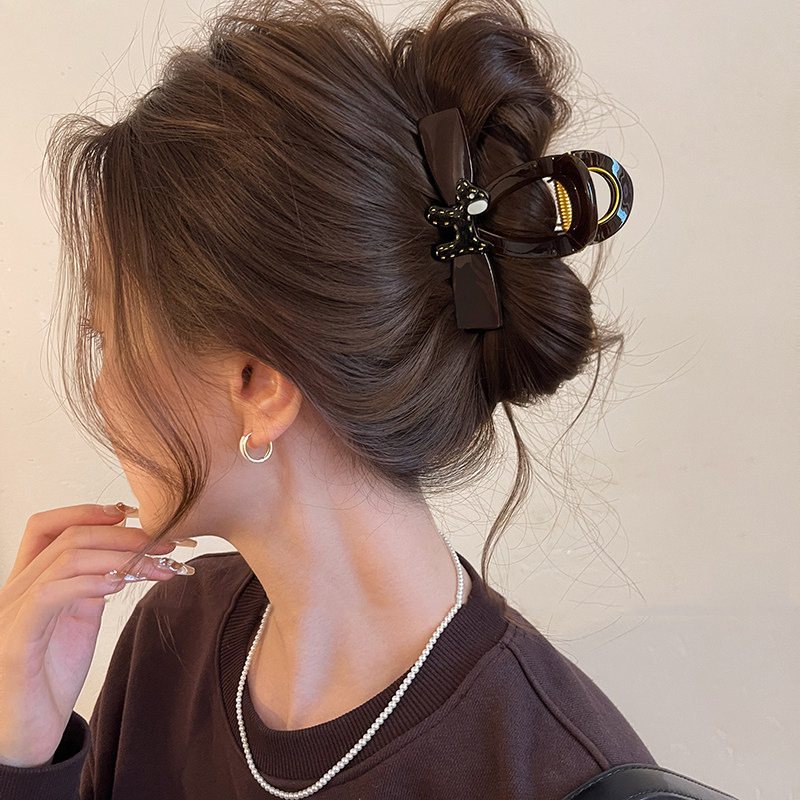 Black puppy hair claw clip