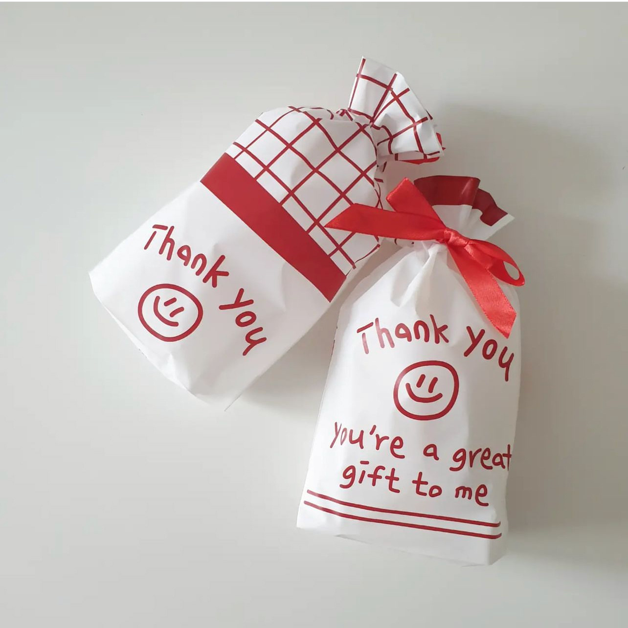 简约ins风格笑脸抽绳收口袋 丝带蝴蝶结可爱笑脸糖果礼物包装袋