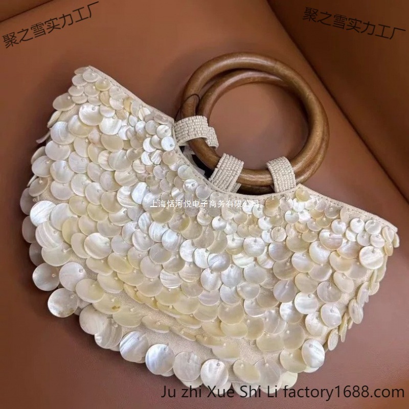 2025 primavera y verano nuevo estilo de alta sensación pura mano natural conchas bolsas de hadas bolsas portátiles bolsas de mujer pequeñas tendencia de personalidad crowdsourcing