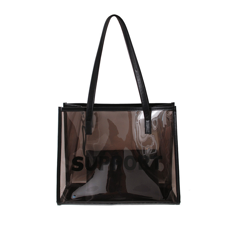 Bolso de jalea transparente para mujer 2023 primavera y verano nuevo estilo coreano de moda bolso portátil de moda para madre e hijo Bolso grande al por mayor
