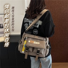 斜挎补课包女生潮牌日系情侣大容量单肩包男学生多功能邮差包包