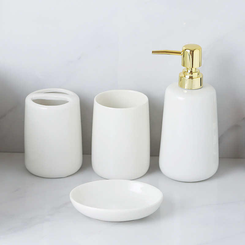 Kit de lavado de lujo ligero de alta calidad botella de embalaje de baño blanco puro simple botella de emulsión de baño cerámica de cuatro piezas set